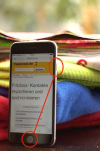 Home-Taste und Ein-Aus-Schalter gleichzeitig drücken - (Foto: Martin Goldmann) iPhone Screenshot mit Tastenkombination Home und Ein/Aus